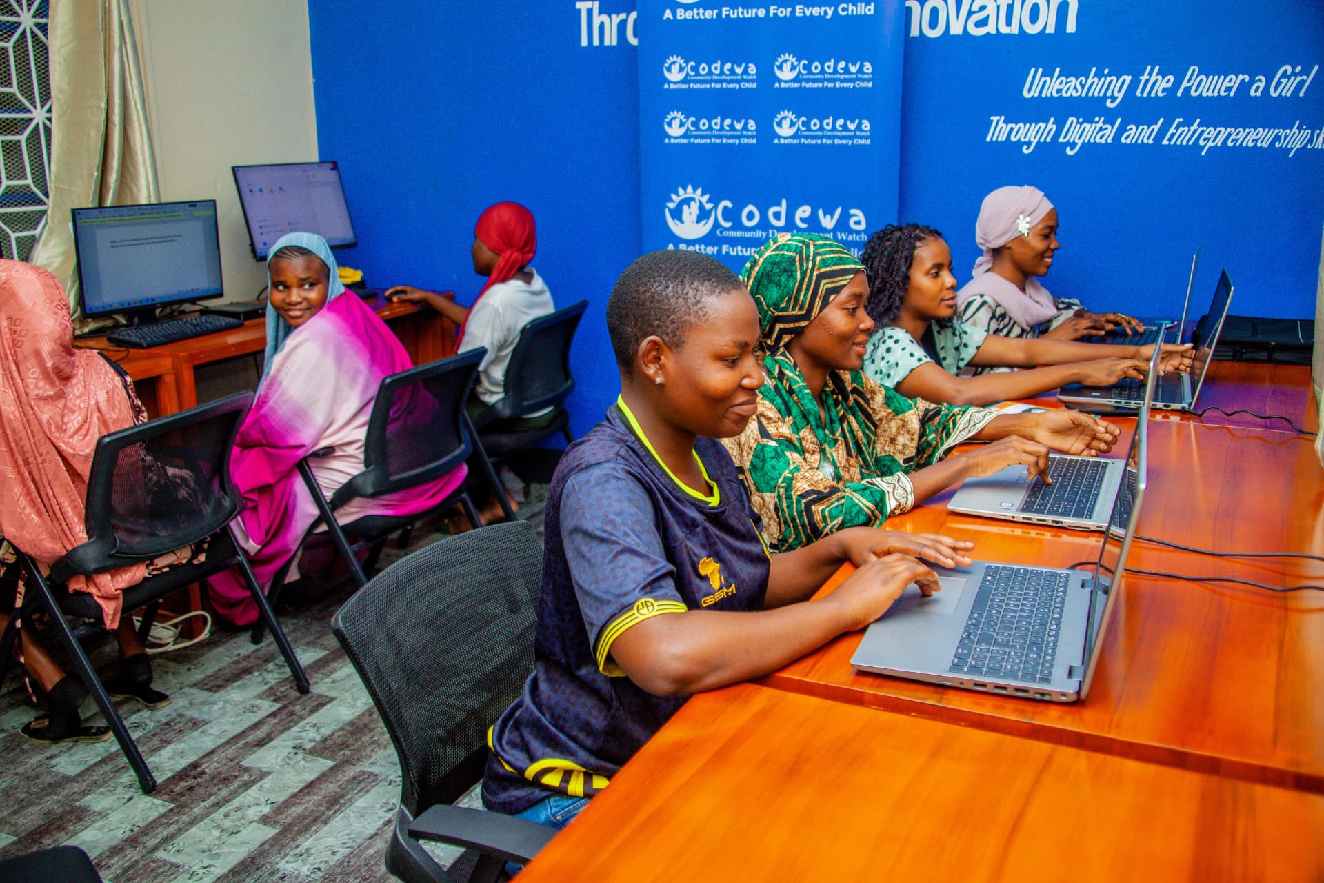 Students at workstations in the CODEWA IT lab